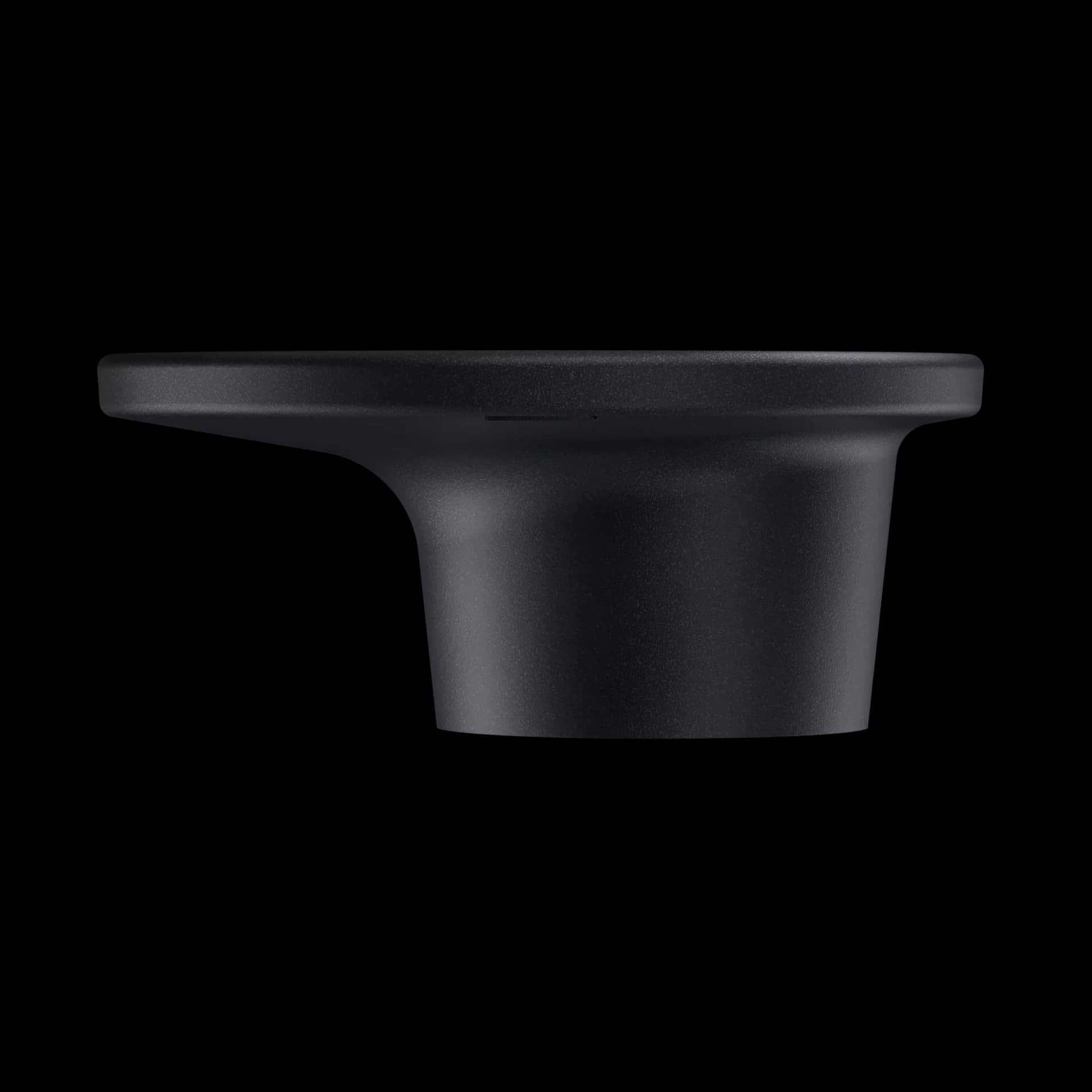 Sort rund kabelholder. Viser at ene siden er lengre enn andre for å holde kabel bedre.